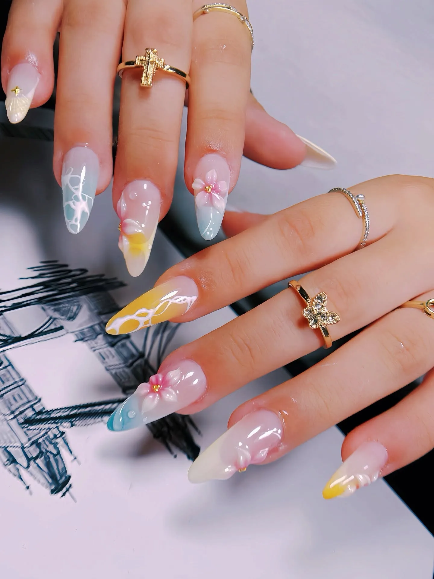 Pastel 3D sculpted floral nail art